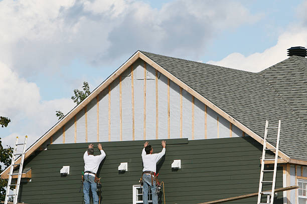 Professional Emergency Siding Repair technician working in Randolph, MN